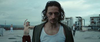 Movie still from “Hozier - Movement” (2018), directed by Us – Close Up shot, Low angle