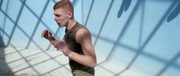 Movie still from “Agoria - Embrace” (2018), directed by Jessy Moussallem – Medium shot, Low angle