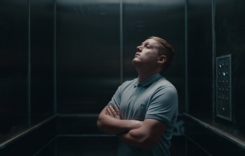 Movie still from “Wilkinson - I Need” (2018), directed by Charlotte Regan – Medium shot, Low angle