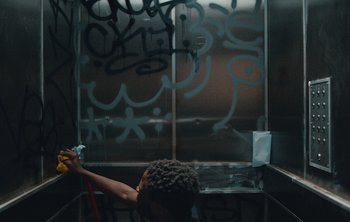 Movie still from “Wilkinson - I Need” (2018), directed by Charlotte Regan – Medium shot, Overhead angle