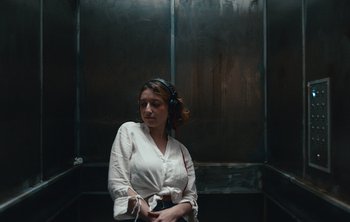 Movie still from “Wilkinson - I Need” (2018), directed by Charlotte Regan – Medium shot, Low angle