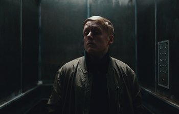 Movie still from “Wilkinson - I Need” (2018), directed by Charlotte Regan – Medium shot, Low angle