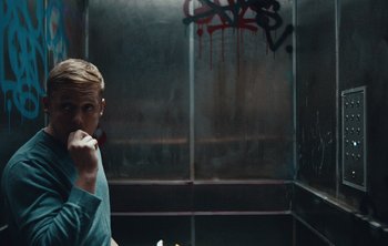 Movie still from “Wilkinson - I Need” (2018), directed by Charlotte Regan – Medium shot, Low angle