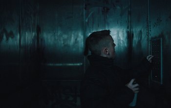 Movie still from “Wilkinson - I Need” (2018), directed by Charlotte Regan – Medium shot, Low angle