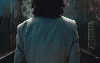 Movie still from “Wilkinson - I Need” (2018), directed by Charlotte Regan – Medium shot, Over the shoulder angle