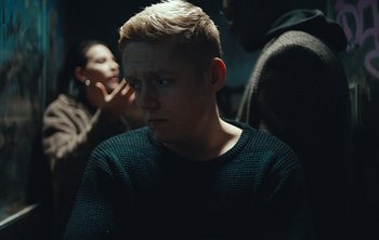 Movie still from “Wilkinson - I Need” (2018), directed by Charlotte Regan – Close Up shot, Over the shoulder angle