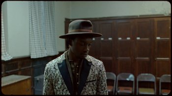 Movie still from “Prince - Mary Don’t You Weep” (2018), directed by Salomon Ligthelm – Medium shot, Over the shoulder angle