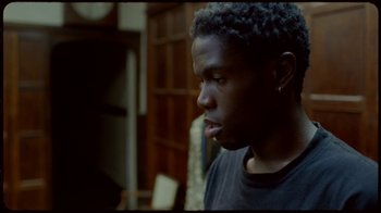 Movie still from “Prince - Mary Don’t You Weep” (2018), directed by Salomon Ligthelm – Close Up shot, Over the shoulder angle