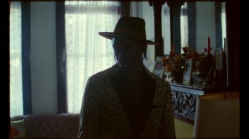 Movie still from “Prince - Mary Don’t You Weep” (2018), directed by Salomon Ligthelm – Medium shot, Over the shoulder angle