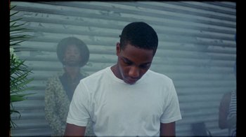 Movie still from “Prince - Mary Don’t You Weep” (2018), directed by Salomon Ligthelm – Medium shot, Low angle