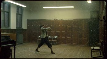 Movie still from “Prince - Mary Don’t You Weep” (2018), directed by Salomon Ligthelm – Wide shot, Low angle