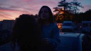 Movie still from “The Blaze - Queens” (2018), directed by The Blaze – Medium shot, Over the shoulder angle