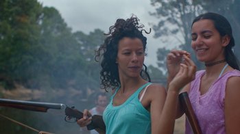 Movie still from “The Blaze - Queens” (2018), directed by The Blaze – Medium shot, Over the shoulder angle