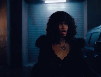 Movie still from “Kenzie - Funeral” (2018), directed by Camille Summers-Valli – Medium shot, Low angle