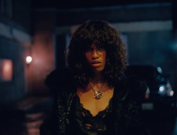 Movie still from “Kenzie - Funeral” (2018), directed by Camille Summers-Valli – Close Up shot, Low angle