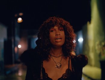 Movie still from “Kenzie - Funeral” (2018), directed by Camille Summers-Valli – Close Up shot, Low angle