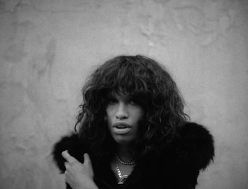 Movie still from “Kenzie - Funeral” (2018), directed by Camille Summers-Valli – Close Up shot, Low angle