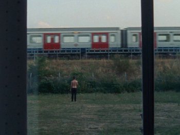 Movie still from “Sam Fender - Dead Boys” (2018), directed by Vincent Haycock – Extreme Wide shot, Over the shoulder angle