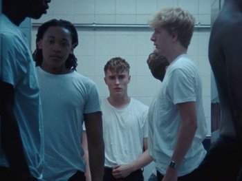 Movie still from “Sam Fender - Dead Boys” (2018), directed by Vincent Haycock – Medium shot, High angle