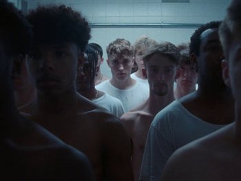 Movie still from “Sam Fender - Dead Boys” (2018), directed by Vincent Haycock – Medium shot, High angle