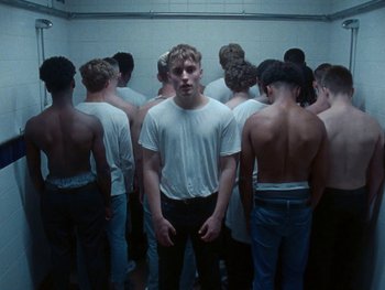 Movie still from “Sam Fender - Dead Boys” (2018), directed by Vincent Haycock – Medium shot, Low angle