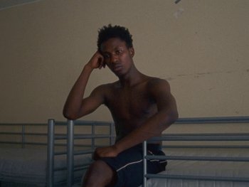 Movie still from “Sam Fender - Dead Boys” (2018), directed by Vincent Haycock – Medium shot, Low angle