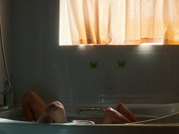 Movie still from “Sam Fender - Dead Boys” (2018), directed by Vincent Haycock – Medium shot, Overhead angle
