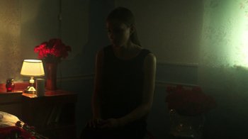 Movie still from “Sophie Hunger - Tricks” (2018), directed by Matilda Finn – Medium shot, Low angle