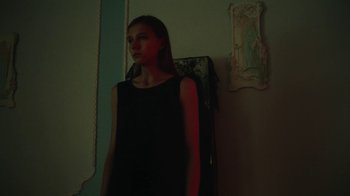 Movie still from “Sophie Hunger - Tricks” (2018), directed by Matilda Finn – Medium shot, Low angle