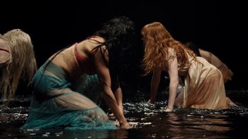 Movie still from “Florence + The Machine - Big God” (2018), directed by Autumn de Wilde – Wide shot, High angle