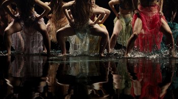 Movie still from “Florence + The Machine - Big God” (2018), directed by Autumn de Wilde – Medium shot, High angle