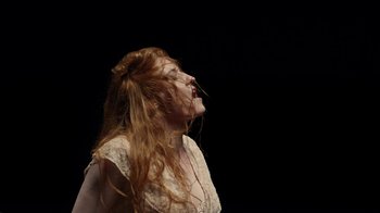 Movie still from “Florence + The Machine - Big God” (2018), directed by Autumn de Wilde – Close Up shot, Low angle