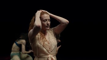 Movie still from “Florence + The Machine - Big God” (2018), directed by Autumn de Wilde – Medium shot, Over the shoulder angle