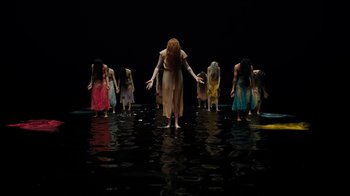 Movie still from “Florence + The Machine - Big God” (2018), directed by Autumn de Wilde – Wide shot, High angle