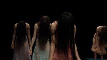 Movie still from “Florence + The Machine - Big God” (2018), directed by Autumn de Wilde – Medium shot, High angle