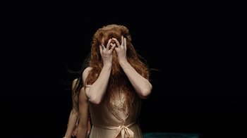 Movie still from “Florence + The Machine - Big God” (2018), directed by Autumn de Wilde – Medium shot, Over the shoulder angle