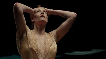 Movie still from “Florence + The Machine - Big God” (2018), directed by Autumn de Wilde – Close Up shot, High angle