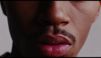 Movie still from “Bearcubs - Underwaterfall” (2018), directed by Salomon Ligthelm – Extreme Close Up shot, Low angle