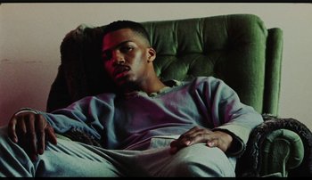 Movie still from “Bearcubs - Underwaterfall” (2018), directed by Salomon Ligthelm – Medium shot, Low angle