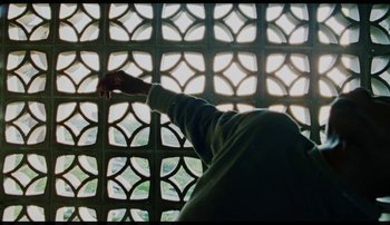 Movie still from “Bearcubs - Underwaterfall” (2018), directed by Salomon Ligthelm – Medium shot, Low angle