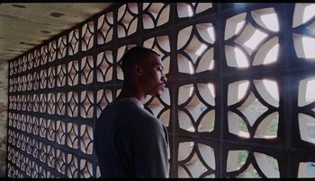 Movie still from “Bearcubs - Underwaterfall” (2018), directed by Salomon Ligthelm – Medium shot, Low angle