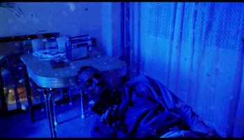 Movie still from “Bearcubs - Underwaterfall” (2018), directed by Salomon Ligthelm – Medium shot, Overhead angle