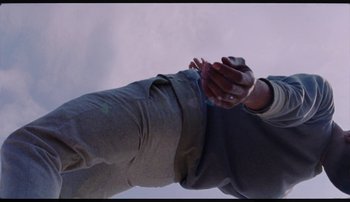 Movie still from “Bearcubs - Underwaterfall” (2018), directed by Salomon Ligthelm – Extreme Close Up shot, Overhead angle