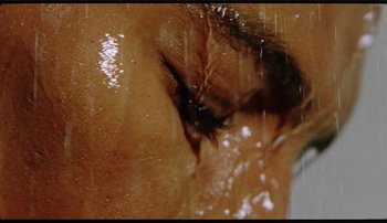 Movie still from “Bearcubs - Underwaterfall” (2018), directed by Salomon Ligthelm – Extreme Close Up shot, Overhead angle