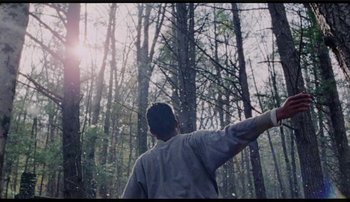 Movie still from “Bearcubs - Underwaterfall” (2018), directed by Salomon Ligthelm – Medium shot, Low angle