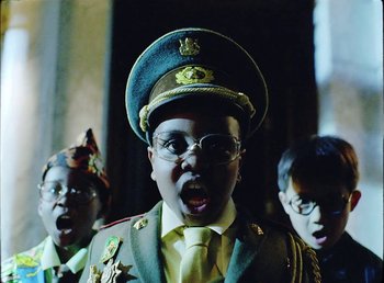 Movie still from “Young Fathers - Toy” (2018), directed by Salomon Ligthelm – Close Up shot, Low angle