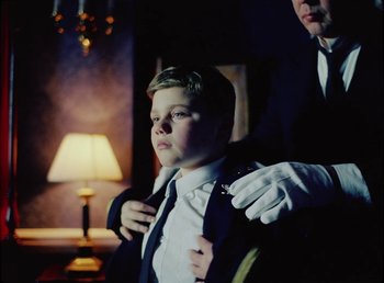 Movie still from “Young Fathers - Toy” (2018), directed by Salomon Ligthelm – Medium shot, Low angle