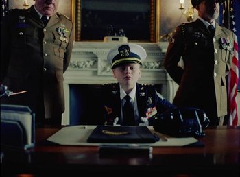 Movie still from “Young Fathers - Toy” (2018), directed by Salomon Ligthelm – Medium shot, Low angle