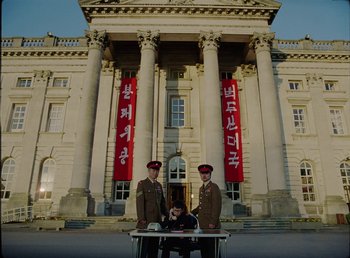 Movie still from “Young Fathers - Toy” (2018), directed by Salomon Ligthelm – Extreme Wide shot, Low angle