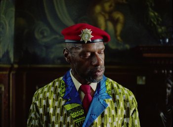 Movie still from “Young Fathers - Toy” (2018), directed by Salomon Ligthelm – Medium shot, Low angle